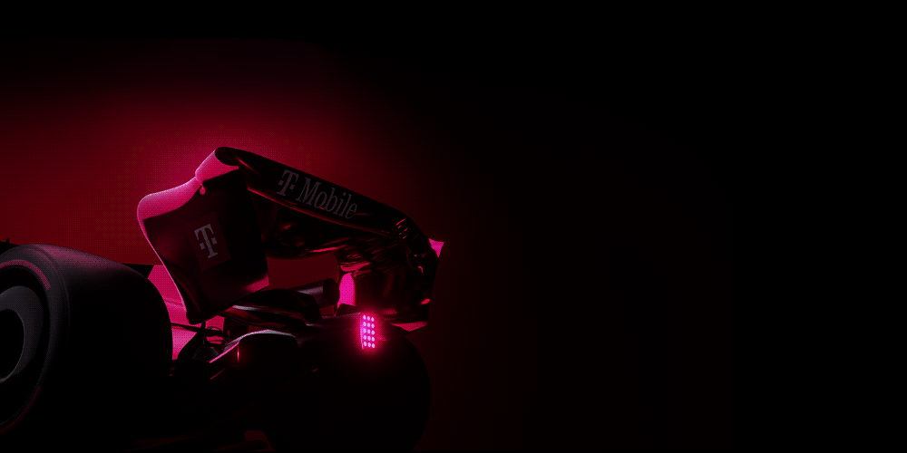 The back of a Magenta racecar featuring the T-Mobile logo.