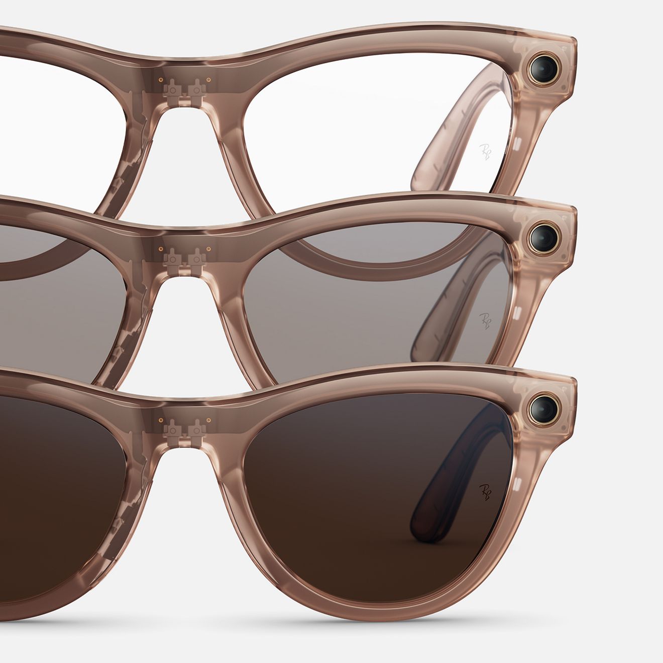 A group of three Ray-Ban Meta sunglasses are featured on a white backdrop. 
