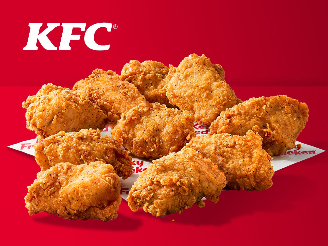 A crispy 10-piece nuggets from KFC are spread out on a napkin.