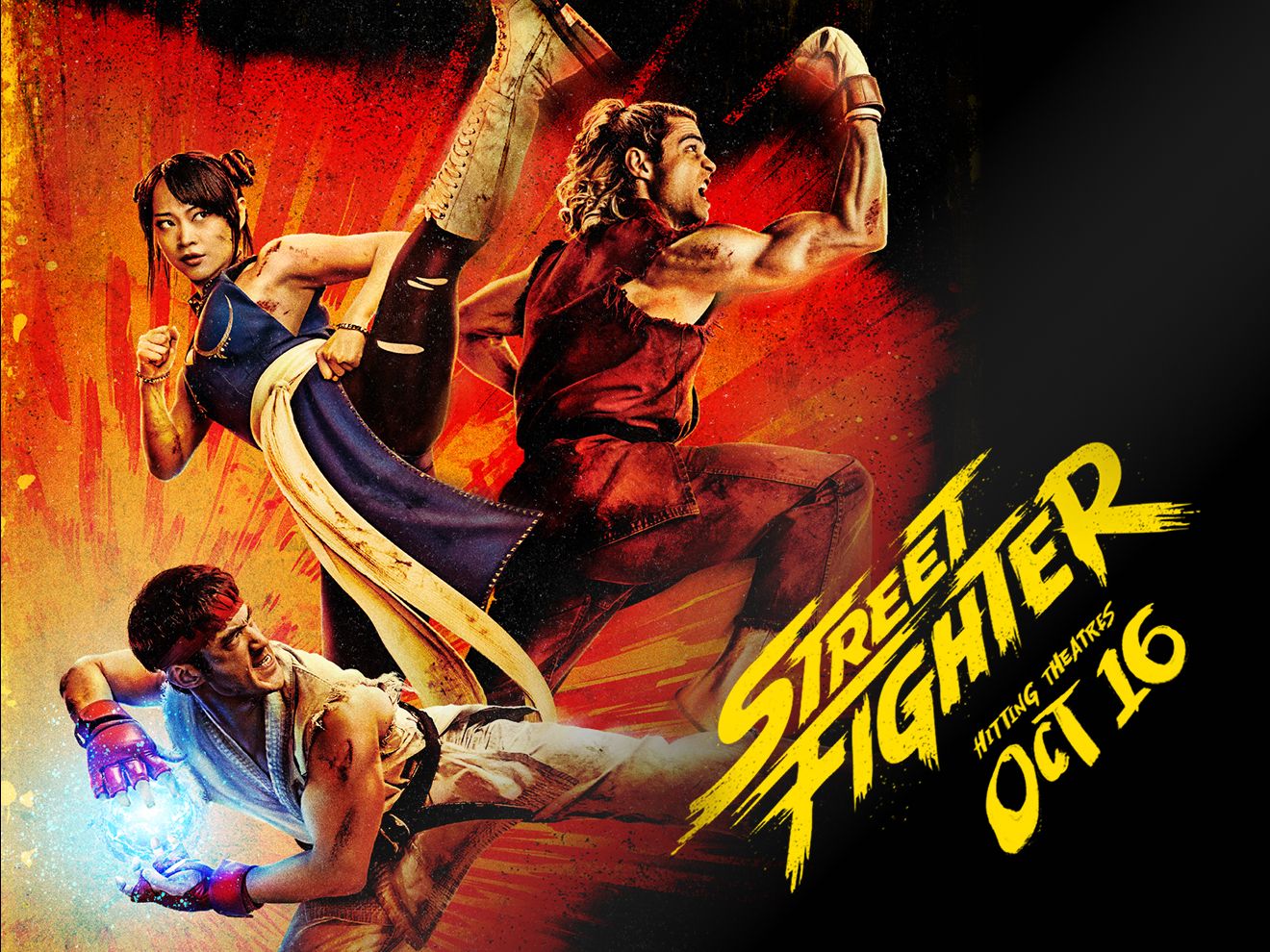 Street Fighter movie poster featuring three characters in fighting poses. In theaters October 16.
