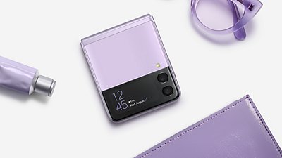 Purple Z Flip3 pictured with matching purple objects