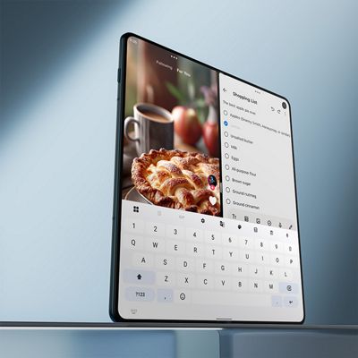 Motorola razr Fold shown open in laptop‑style mode, with a typing keyboard on the lower screen and a recipe displayed on the upper screen.