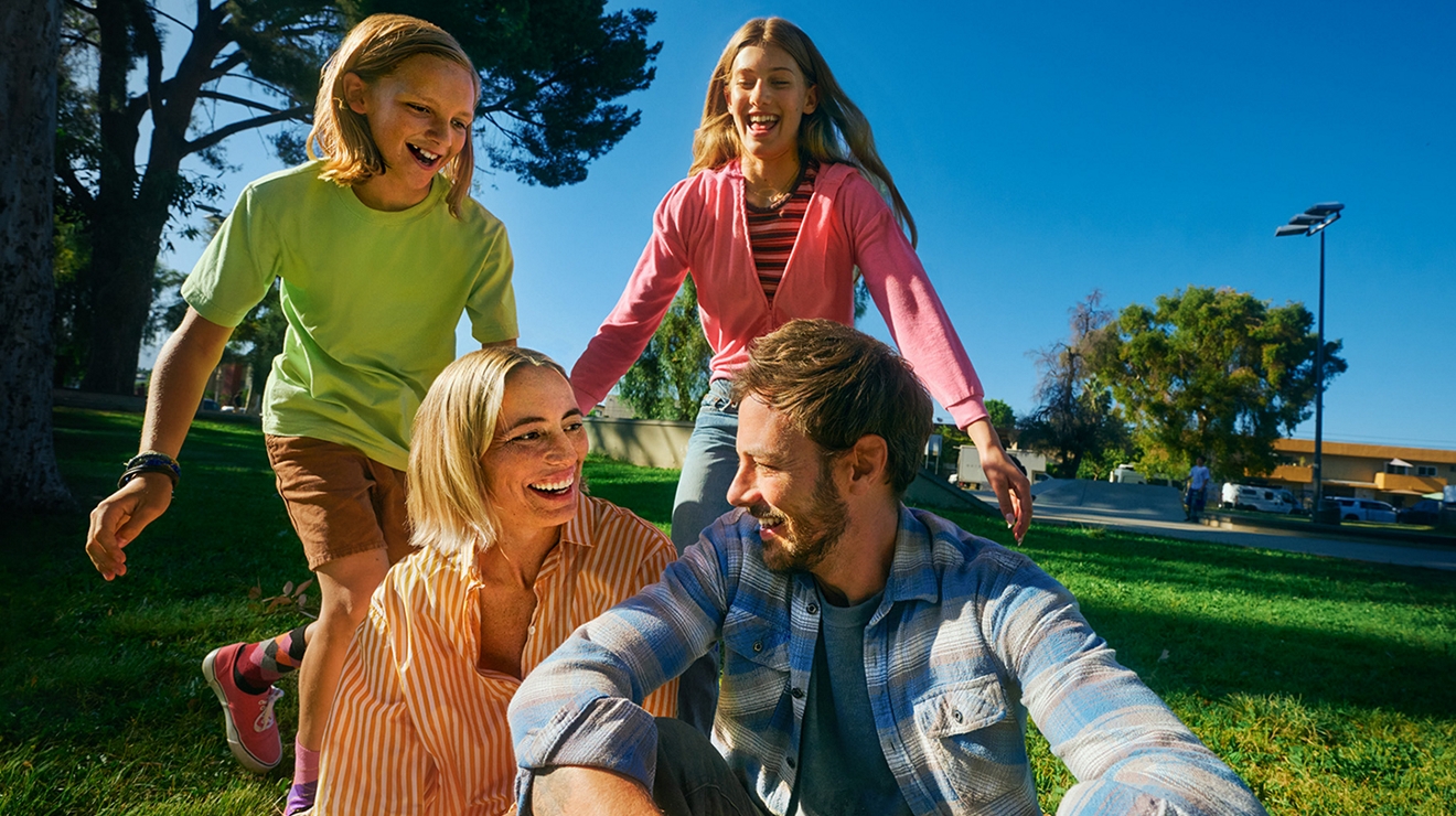 Family playing together in park