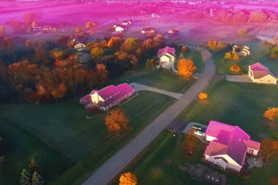 Magenta glow washing over a rural town.