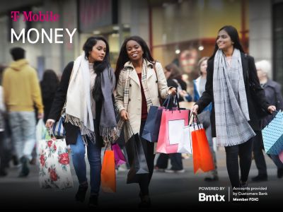 Three friends shopping in the city on a chilly day. T-Mobile MONEY. Powered by Bmtx. Accounts provided by Customers Bank. Member FDIC.