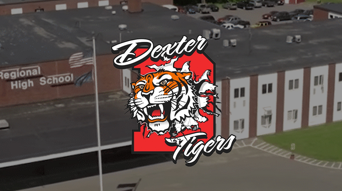 The Dexter Tigers logo over an aerial view of the high school.