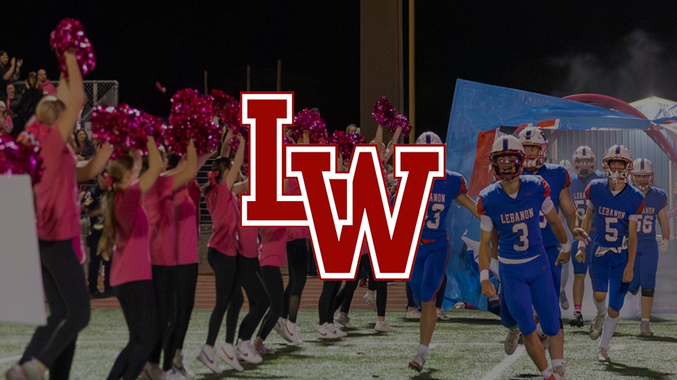 The Lebanon Warriors logo over an image of the team running through a sign. 