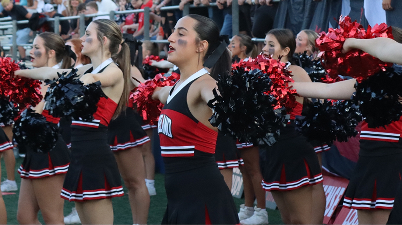 The Loveland High School cheerleaders in black and red