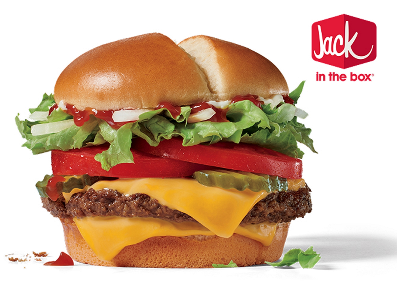 A Jumbo Jack cheeseburger against a white background.