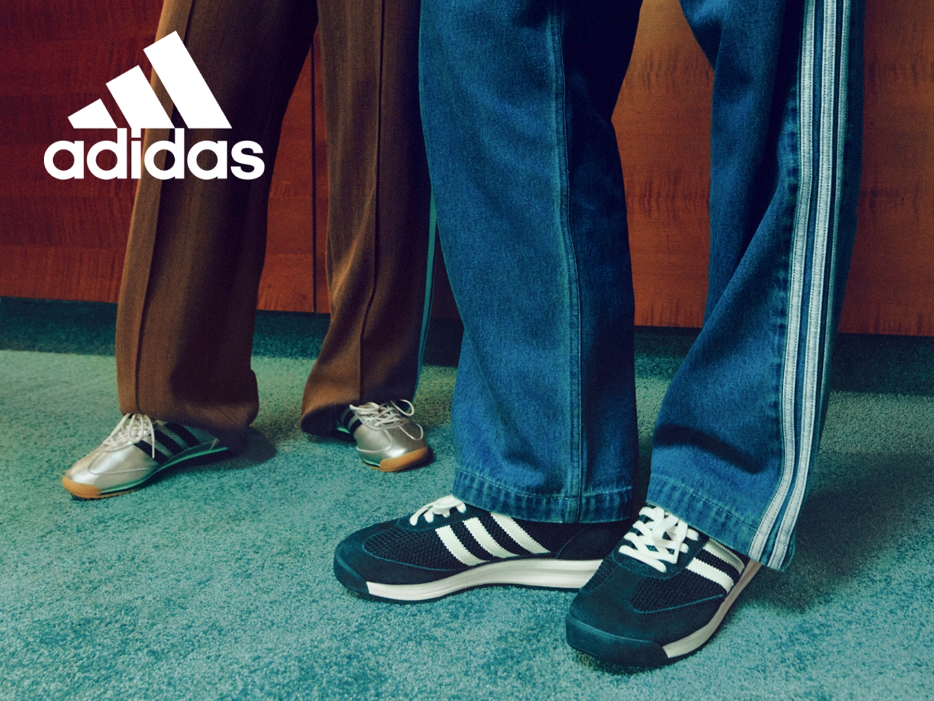 Two people wearing Adidas sneakers.