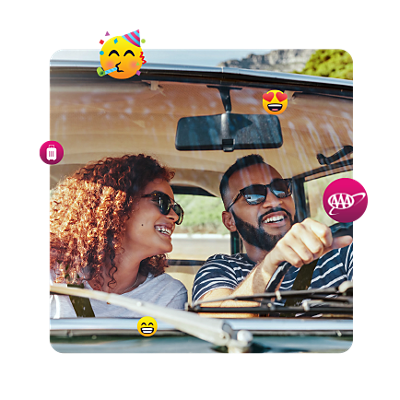 Couple laughing as they drive, surrounded by emojis.
