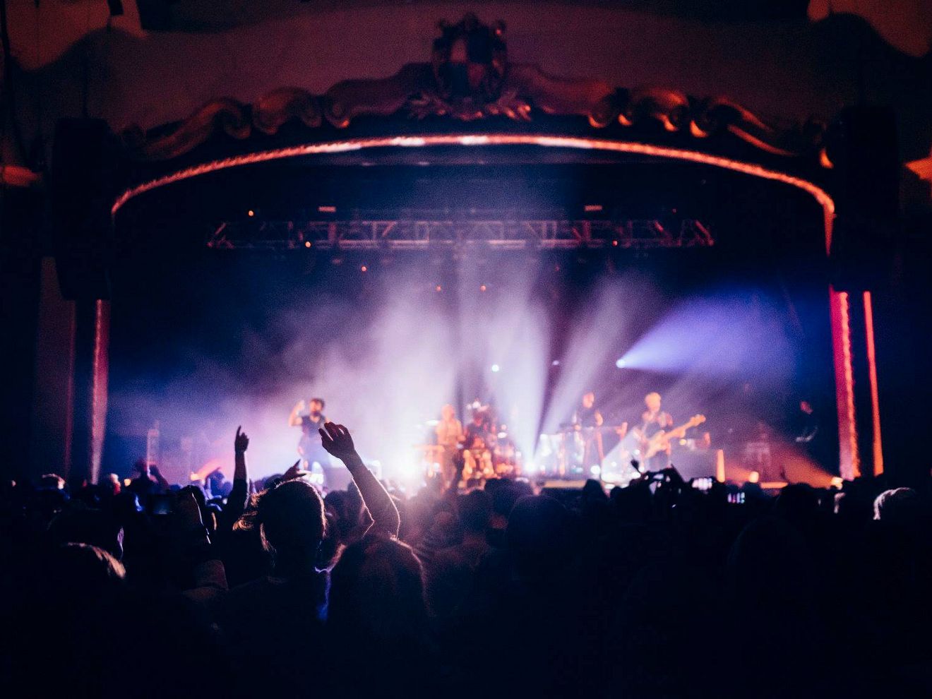 Bright lights on a stage at a concert.