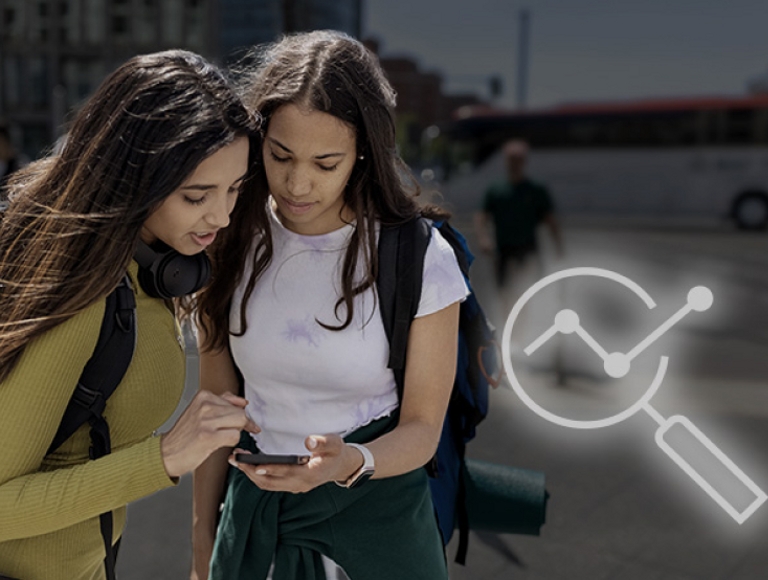 2 women looking at their phone