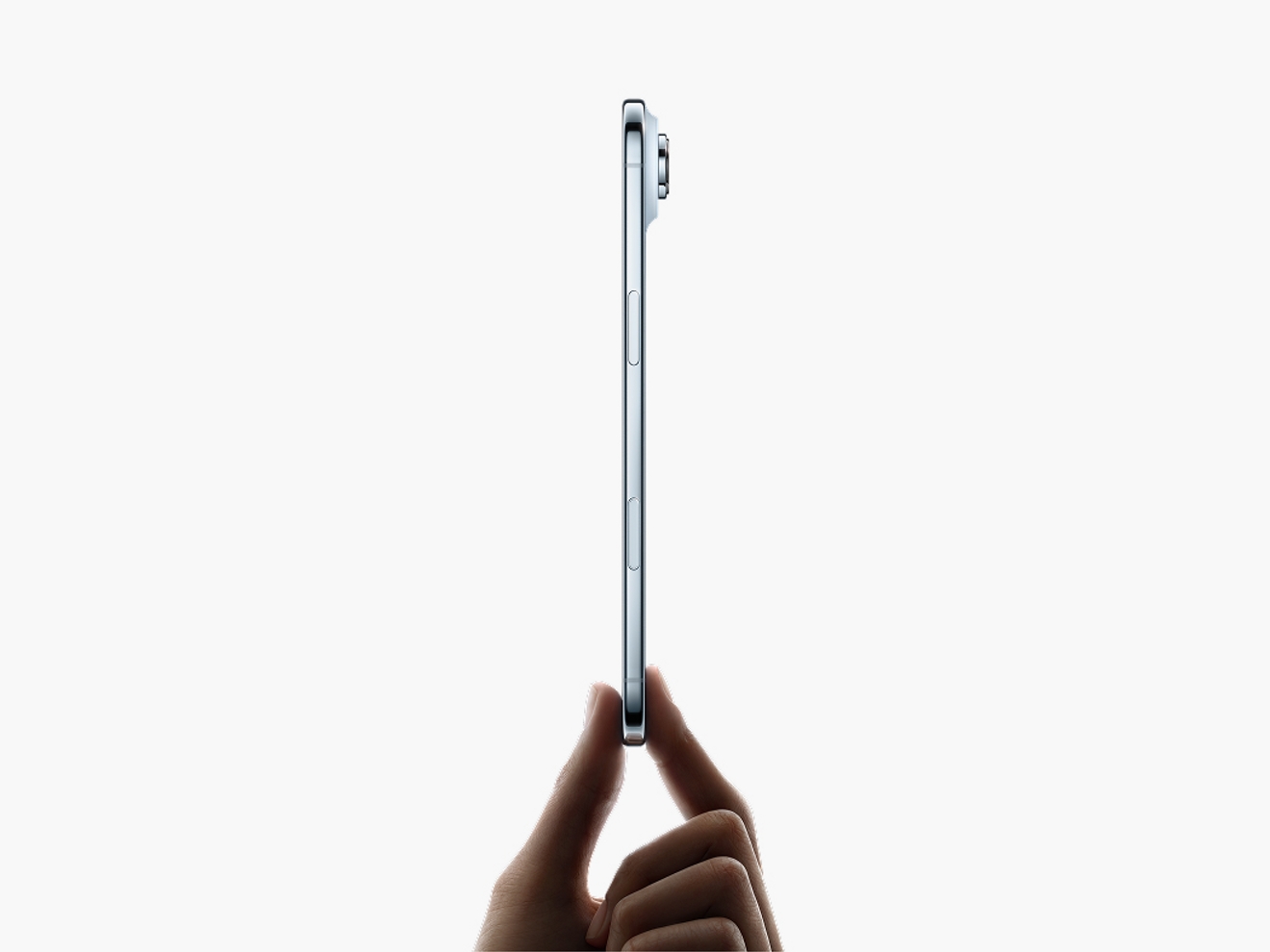 Side view of sky blue iPhone Air demonstrating it’s the thinnest iPhone ever. 