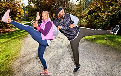 Two people outside in fitness clothing