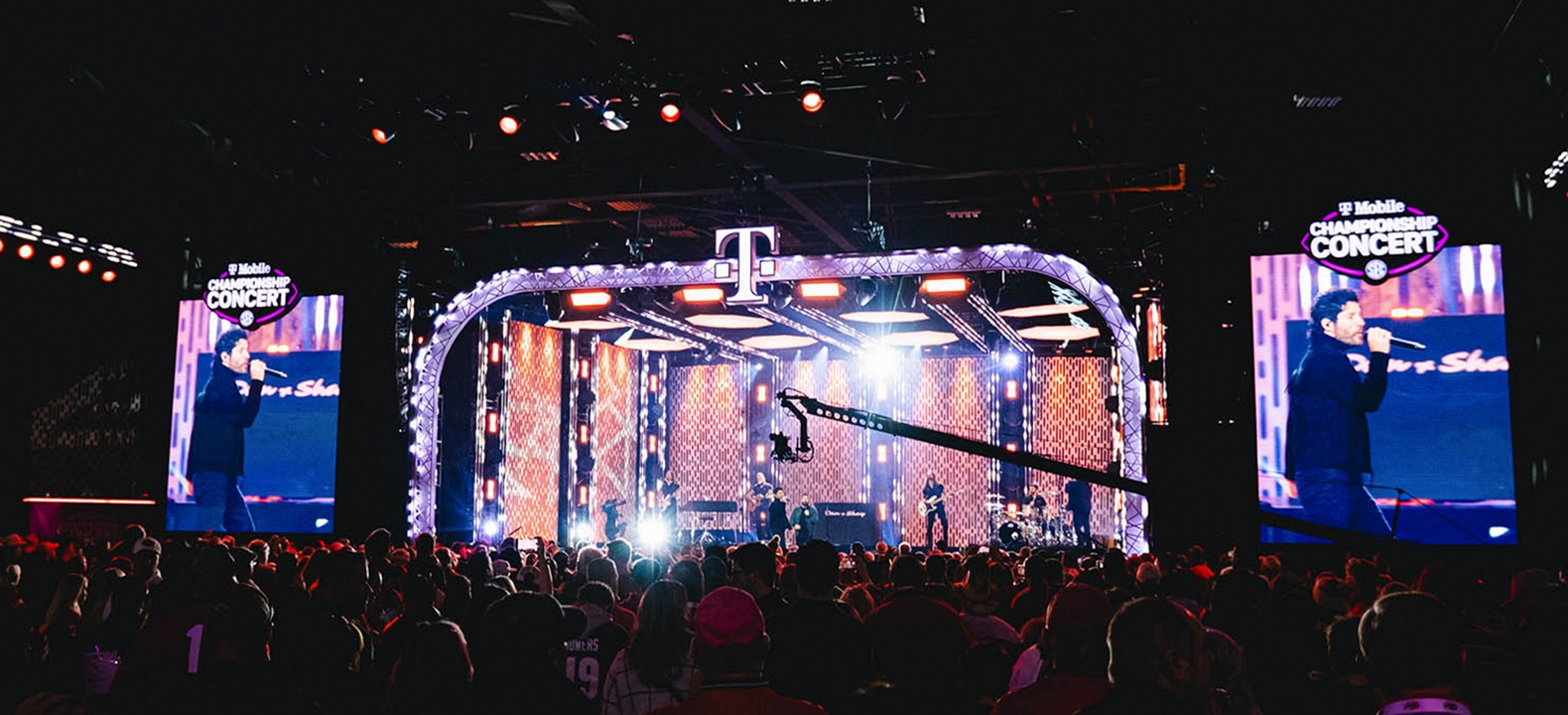 A concert stage in bright lights.