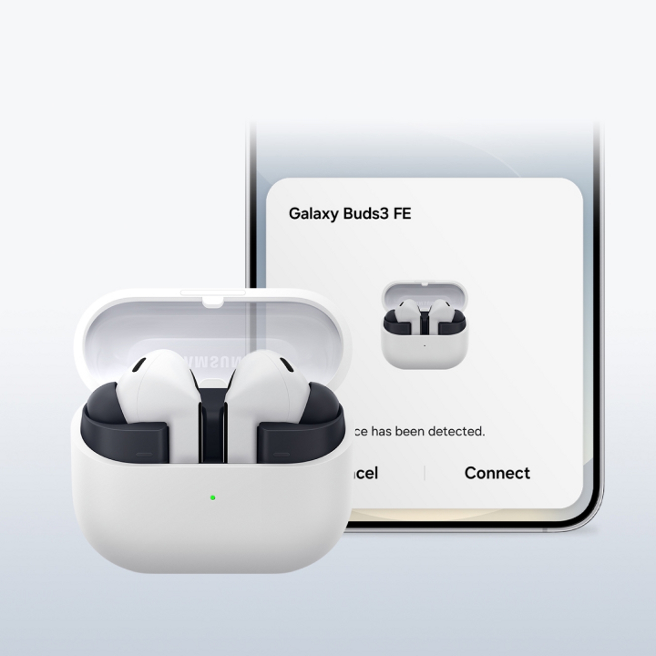 Galaxy Buds3 FE in charging station in front of Samsung Galaxy smart phone showing Buds connected to phone. 