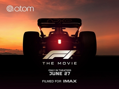 The F1 movie poster featuring the back of a race car against a sunset. 