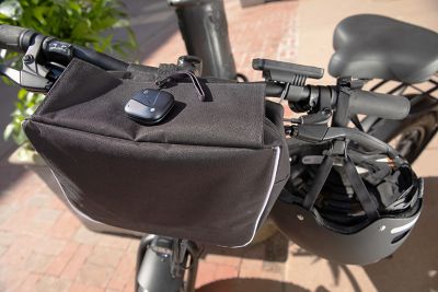Bicycle with tracker on tote