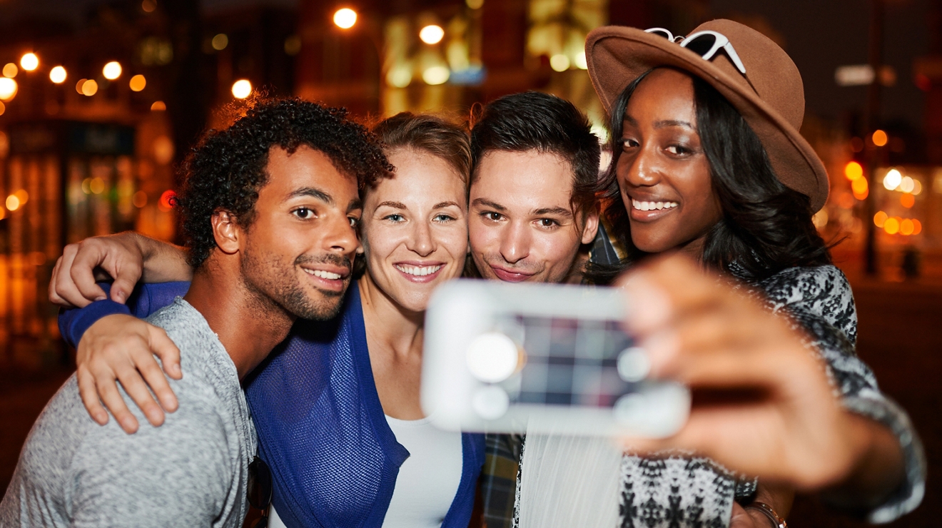 Group of co-workers of taking a selfie