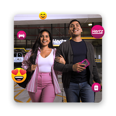 A young couple, surrounded by happy emojis, walks across a Hertz parking lot.