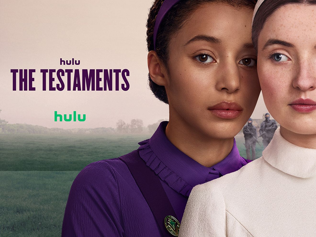 Promo poster for The Testaments, two females standing cheek to cheek on in a hazy field with soldiers in the background.