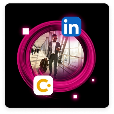 Person pulling luggage through airport as they check their smartphone and surrounded by several online business and travel app logos