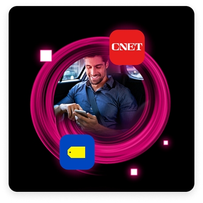 Person riding in rideshare car checking smartphone and surrounded by several tech app logos