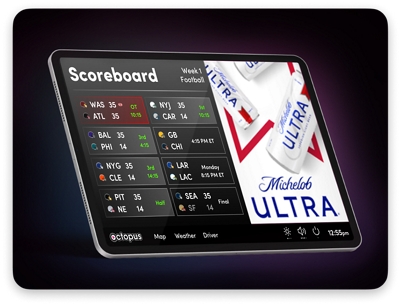 Rideshare tablet showing sports scores surrounded by branded content