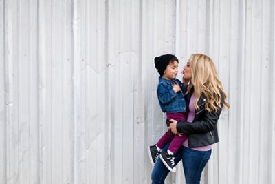 Woman holding her child