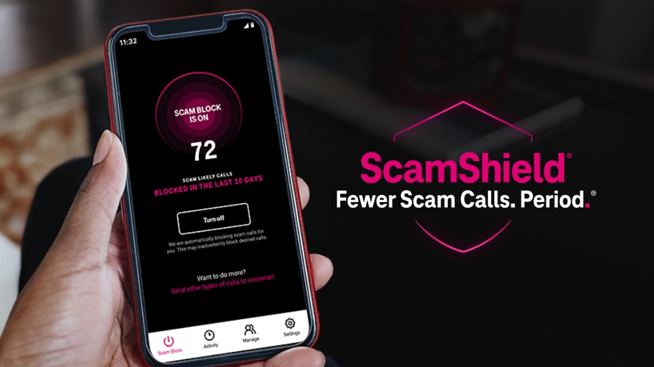 Person holding a smartphone with Scam Shield interface