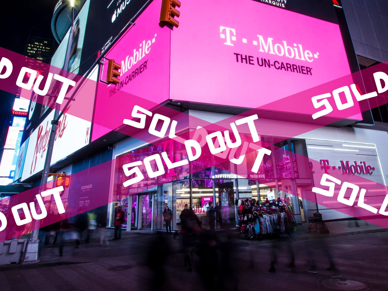  Times Square T-Mobile Signature Store covered by Magenta tape printed with the words “sold out.”