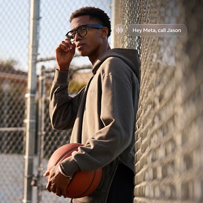 Man playing basketball wearing Oakley Meta glasses