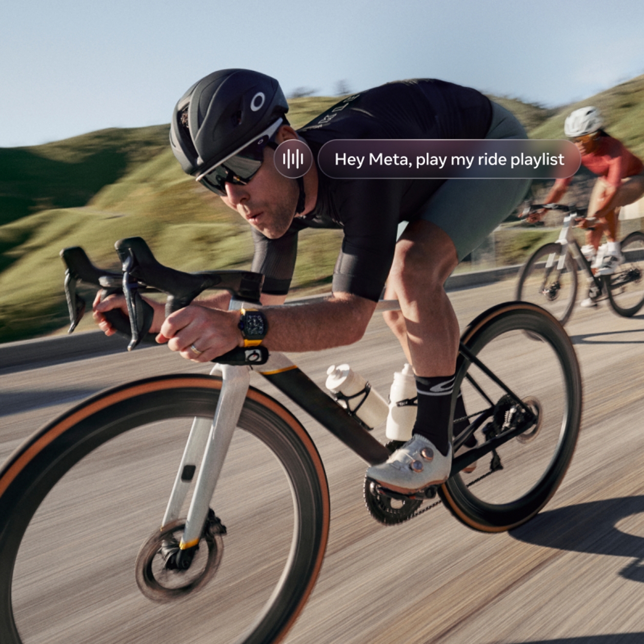 Man biking while wearing Oakley Meta Vanguard glasses