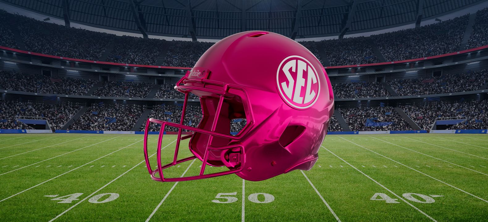 Magenta SEC helmet overlaying a football field. 