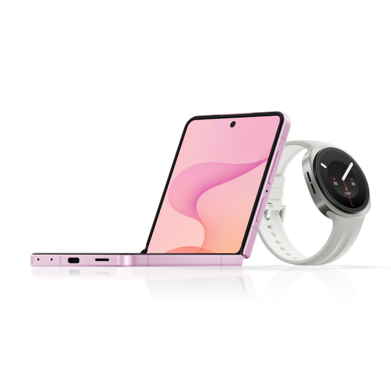 Samsung Galaxy Z Flip8 in pink, shown partially folded beside a Galaxy Watch with a white band, highlighting the slim foldable design.