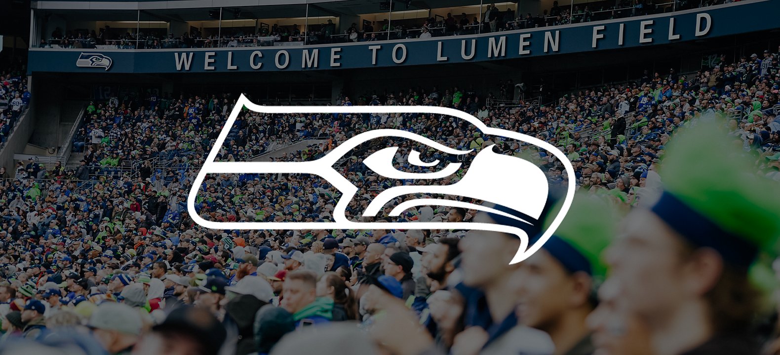 Seattle Seahawks logo overlaying a crowded stadium.