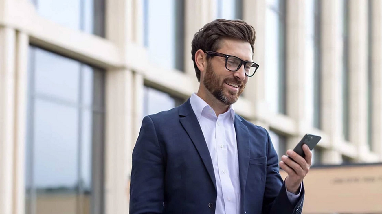 Man looking at his mobile phone