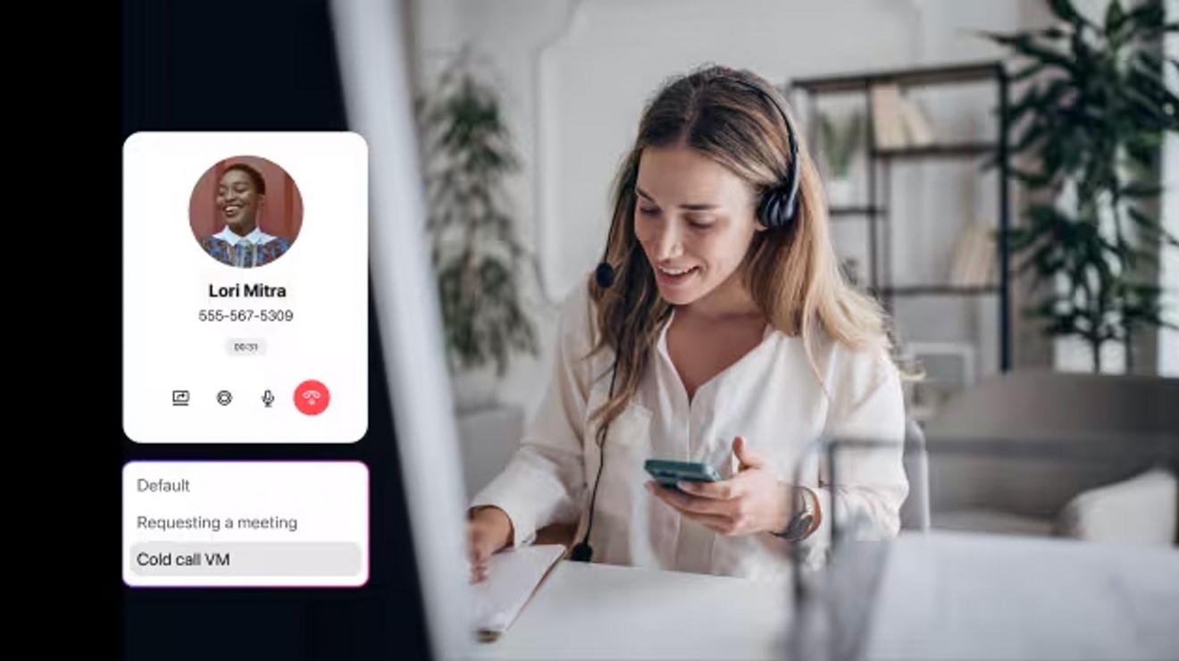 Woman in white blazer holding phone, with a contact profile visible on the screen.