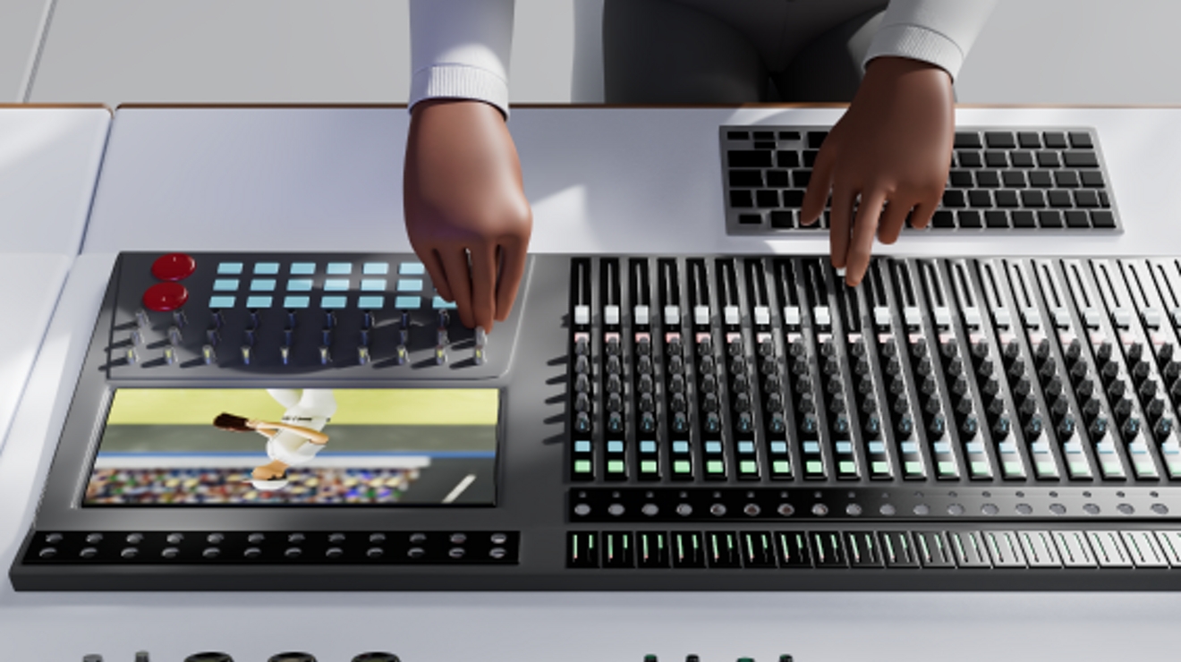 A close-up of a video producer’s hands operating production equipment.