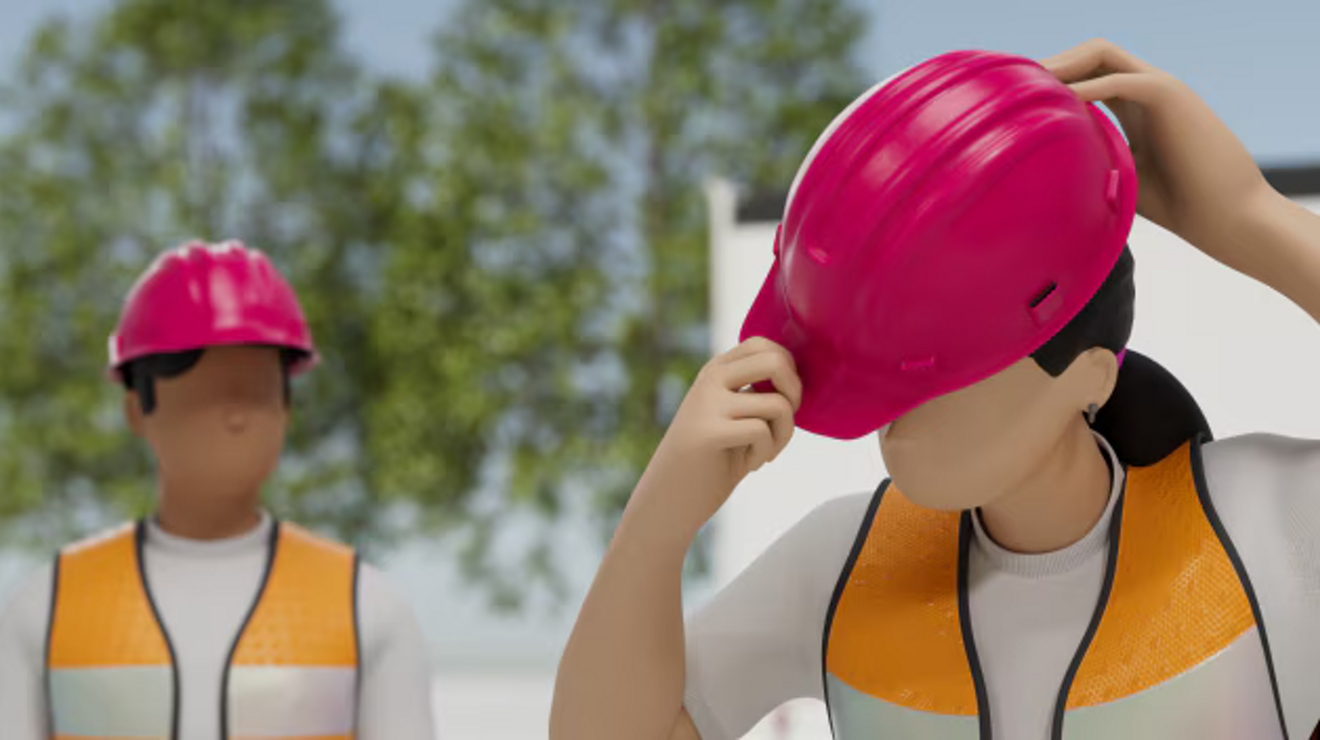 Two construction workers in magenta safety helmets. 