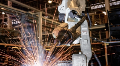 A robotic arm welding.