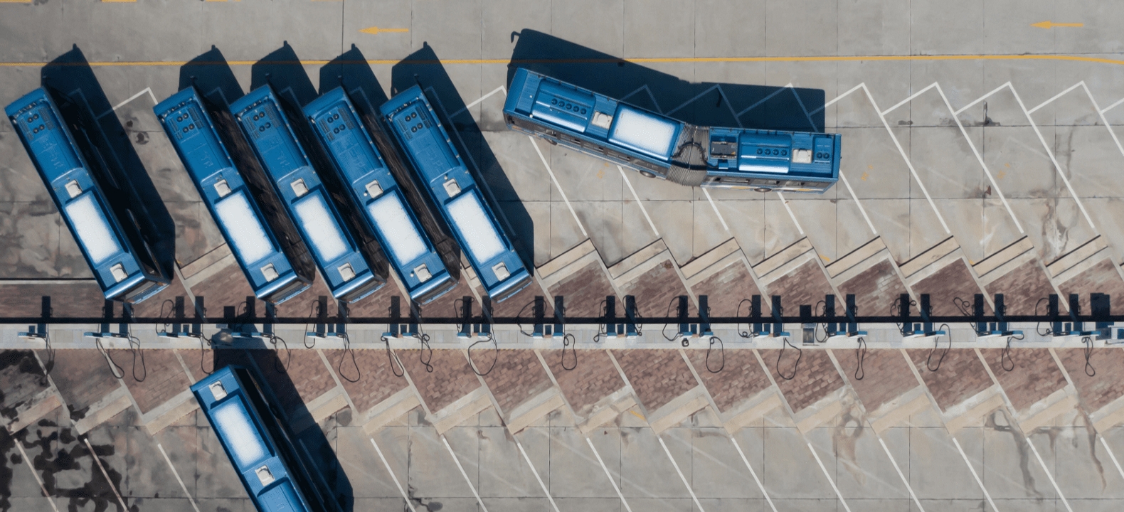 Overhead view of a bus depot.