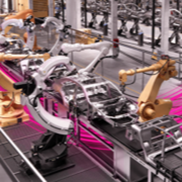 Robots on a factory assembly line