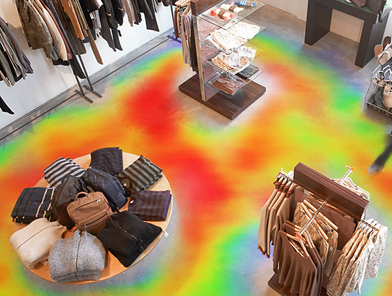 Overhead view of a retail floor space with a multi-color heat map showing high-traffic areas