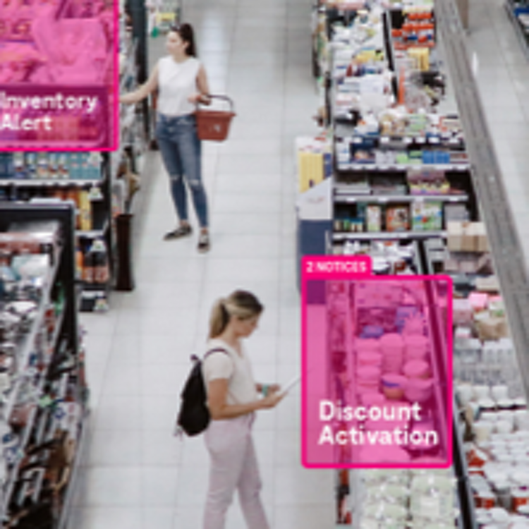 Shoppers stand in aisle at market looking at shelves with magenta callouts about items