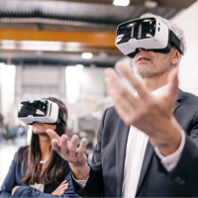 man and woman with vr glasses on