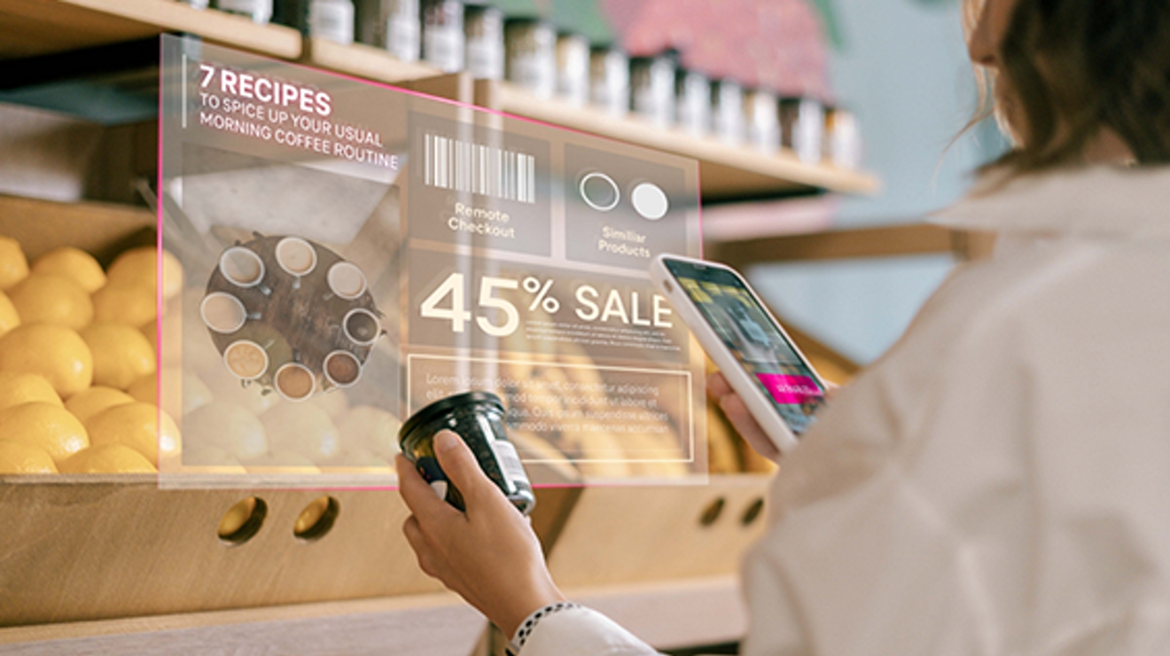 Woman in shop looking at black jar with products on shelves and electronic signage from device