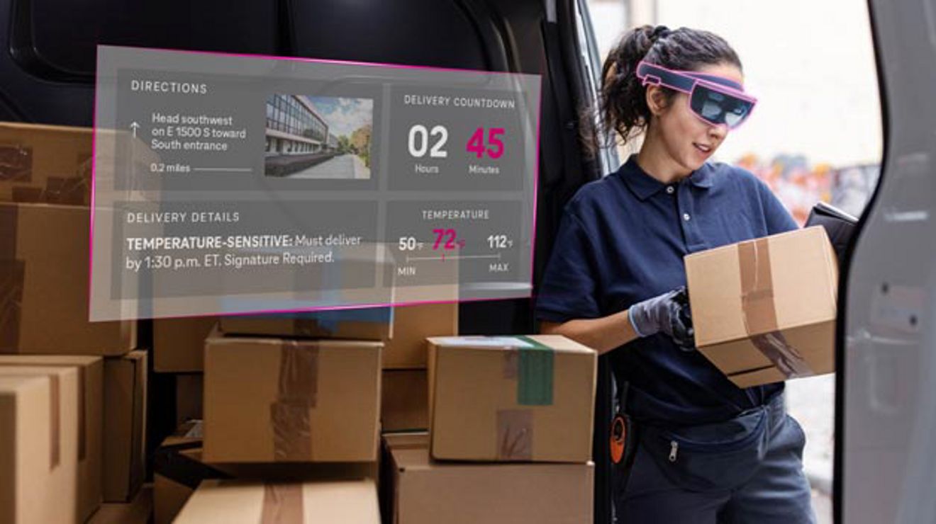 Delivery worker in AR glasses views digital package data, including delivery directions, details, and temperature.