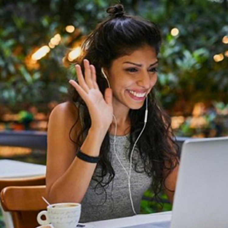 Man and woman, both in business attire, wear VR headsets.